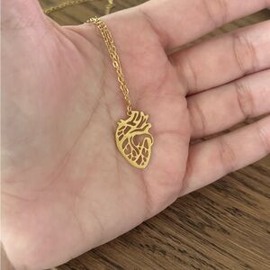 Human heart pendant chain